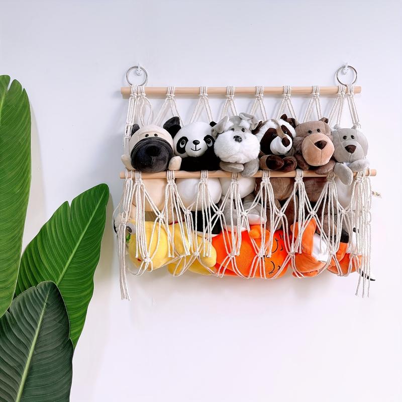 Single layer shelving, children's room with books, dolls, towels, storage, hanging decorations, wooden sticks, plush toys, and mesh pockets Shelves